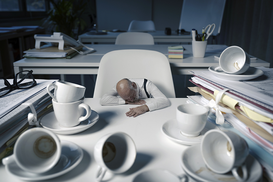 person experiencing daytime fatigue despite sleeping enough